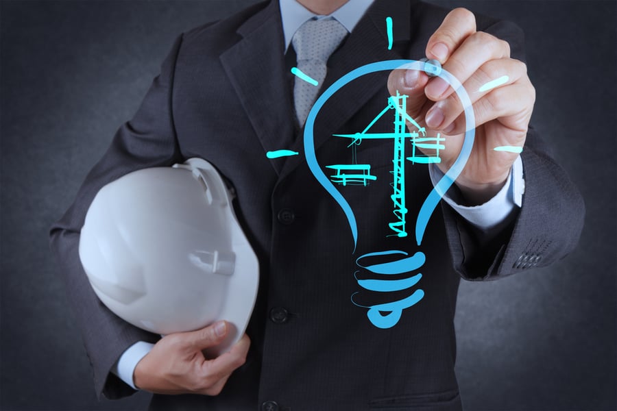 engineer drawing lightbulb and construction as concept